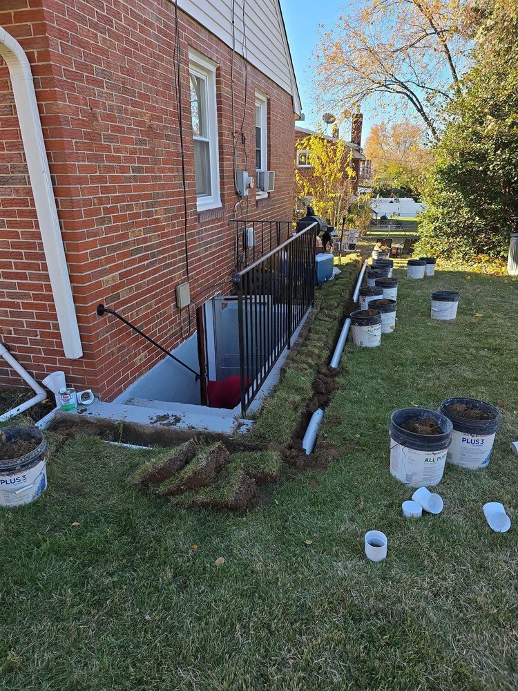buried downspouts job - towson, md 1