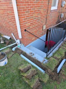 buried downspouts job - towson, md 2